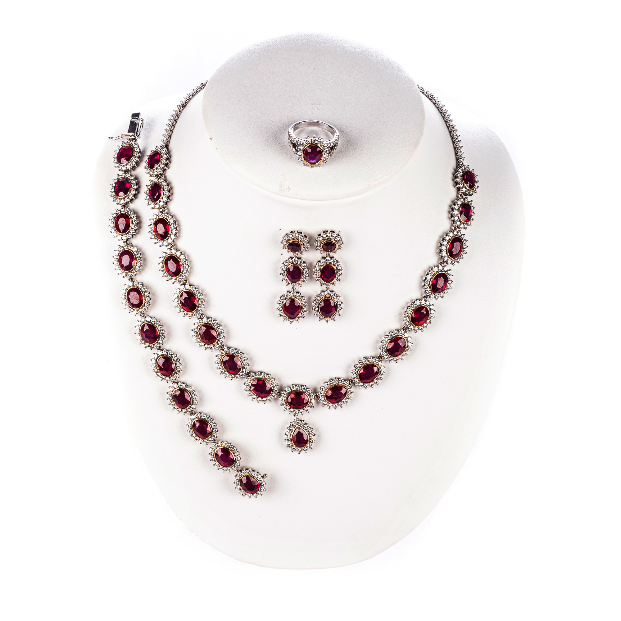 A FLORAL SUITE OF DIAMOND AND RUBY JEWELLERY