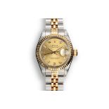 A LADYâ€™S GOLD AND STEEL ROLEX WATCH