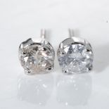 A PAIR OF DIAMOND EARRINGS