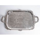 A LARGE GEORGE IV TWO-HANDLED SILVER TEA TRAY