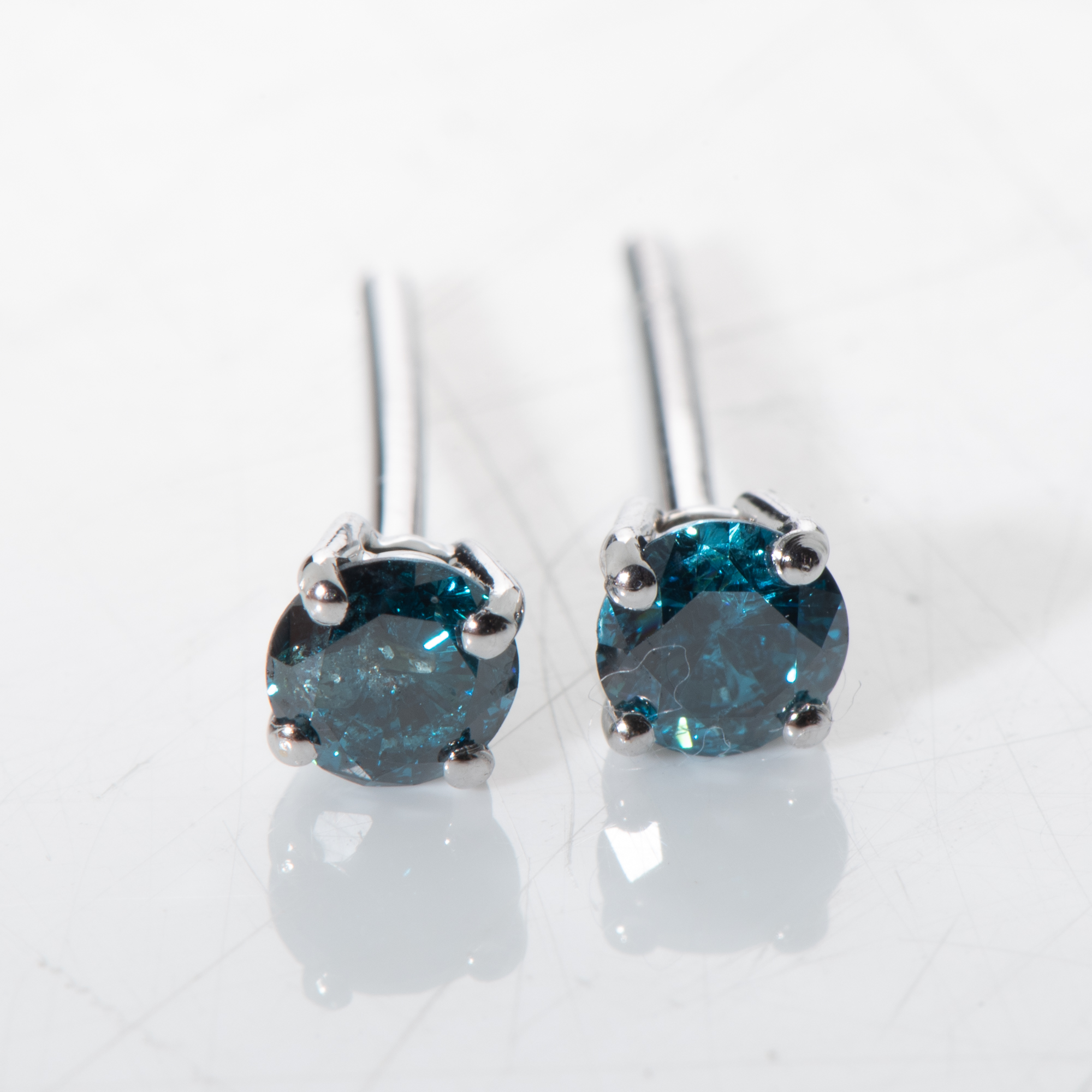 A PAIR OF DIAMOND EARRINGS