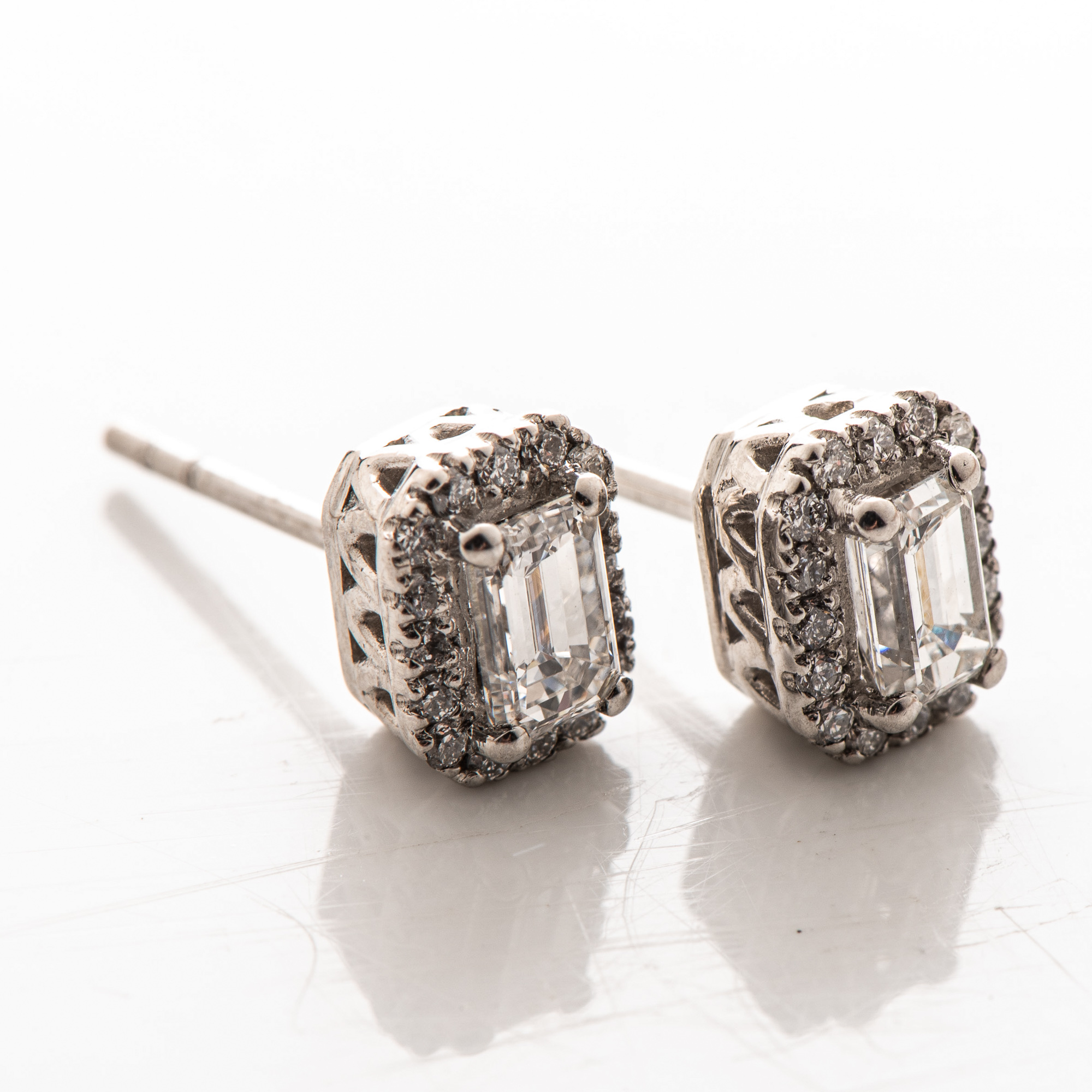 A PAIR OF DIAMOND EARRINGS