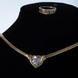 A DIAMOND NECKLACE AND RING