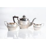 A THREE-PIECE SILVER TEA SET