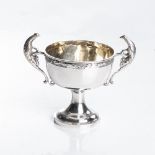 A TWO-HANDLED SILVER CUP