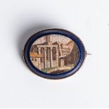 A 19TH CENTURY OVAL MOSAIC BROOCH