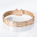 AN 18CT GOLD BANGLE