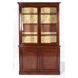 A VICTORIAN MAHOGANY CABINET BOOKCASE