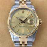 A GENTLEMAN'S ROLEX GOLD AND STEEL WATCH