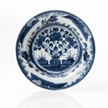 A DUTCH DELFT BLUE AND WHITE PLATE