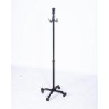 A PAINTED IRON COAT RACK, MANUFACTURED BY STOCKMAN