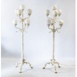 A PAIR OF VICTORIAN PAINTED AND CAST IRON SEVEN LIGHT STANDARD LAMPS