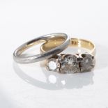 A DIAMOND TRILOGY RING WITH MATCHING BAND