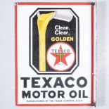 A DOUBLE-SIDED TEXACO MOTOR OIL SIGN