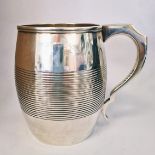 A GEORGE III SILVER PINT MUG