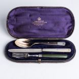 A BONE-HANDLED SILVER BUTTER KNIFE AND THREE-PIECE CHRISTENING SET