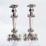 A PAIR OF ELECTROPLATE TABLE CANDLESTICKS