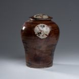 TIM MORRIS (SOUTH AFRICAN 1941 - 1990): A STONEWARE POT AND COVER