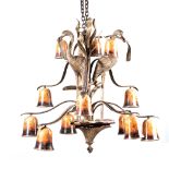 A METAL TWELVE LIGHT CHANDELIER