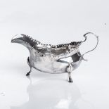 A GEORGE III SILVER SAUCE BOAT