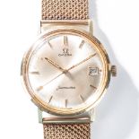 A GENTLEMAN'S 9CT GOLD OMEGA SEAMASTER WATCH