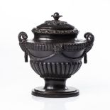 AN OVAL BRONZE URN AND COVER