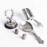 A GEORGE III SHOVEL-FORM CADDY SPOON