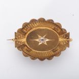 A 14CT GOLD BROOCH