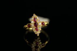 18CT RUBY AND DIAMOND MARQUISE RING, CIRCA 1900s, hallmarked.total weight 3.9 gms, size uk -N,