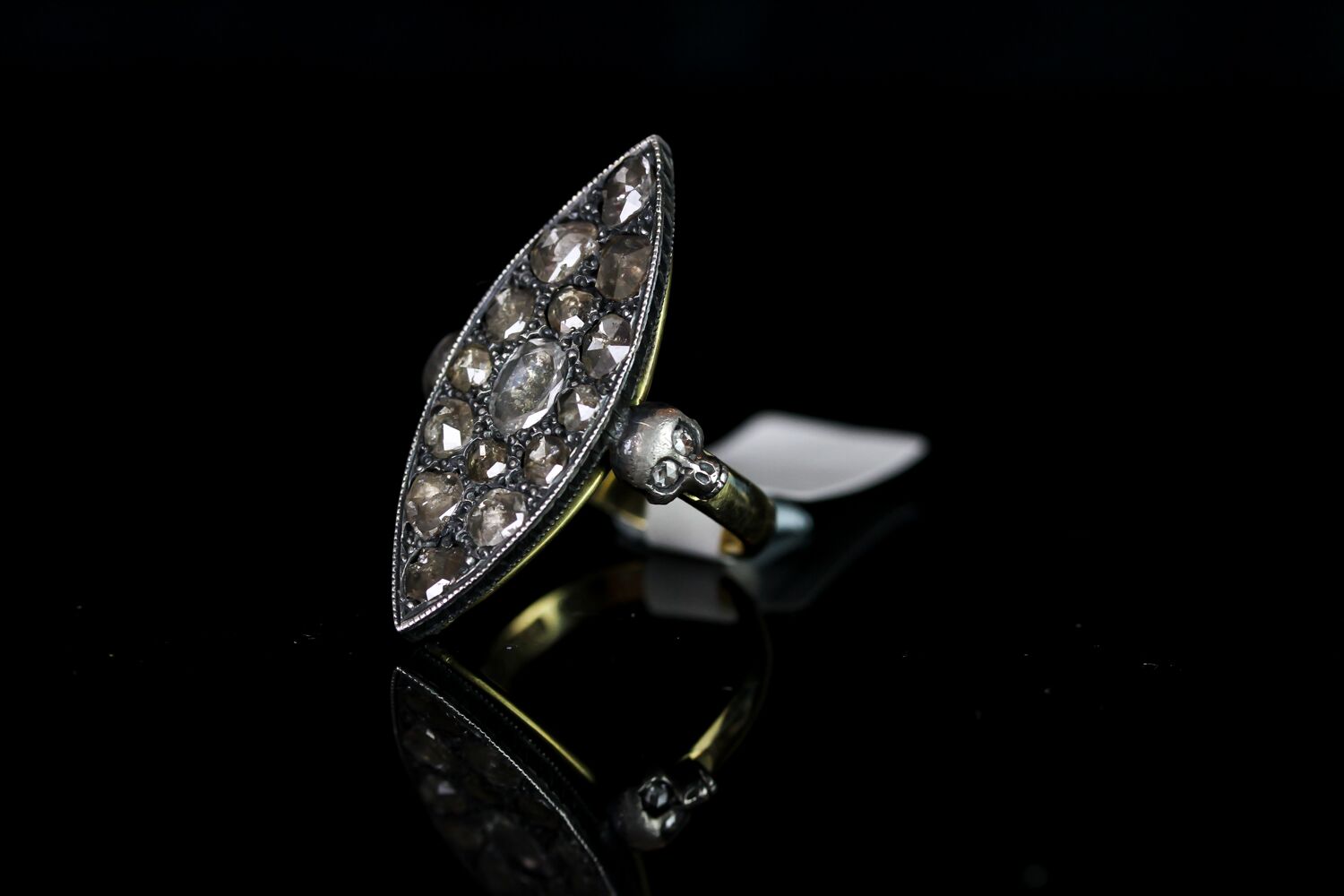 Rose cut diamond ring, silver marquise shape panel set with 15 rose cut diamonds, 2 skulls set - Image 2 of 2