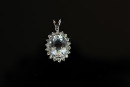 14ct White Gold Aquamarine and Diamond pendant featuring centre, pear cut, light blue Aquamarine (