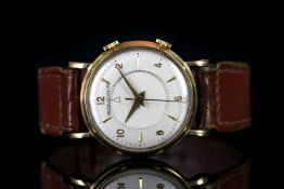 GENTLEMEN'S 18K VINTAGE JAEGER LE COULTRE.silver dial with gold hands, arabic and dart figure, alarm