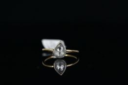 18CT PEAR SHAPED DIAMOND RING,old cut , estimated 6x4mm stone, total weight 4.5gms, ring size M.