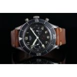 GENTLEMEN'S HEUER 'BUND' MILITARY FLYBACK CHRONOGRAPH WRISTWATCH REF. 1550 SG, circular black twin