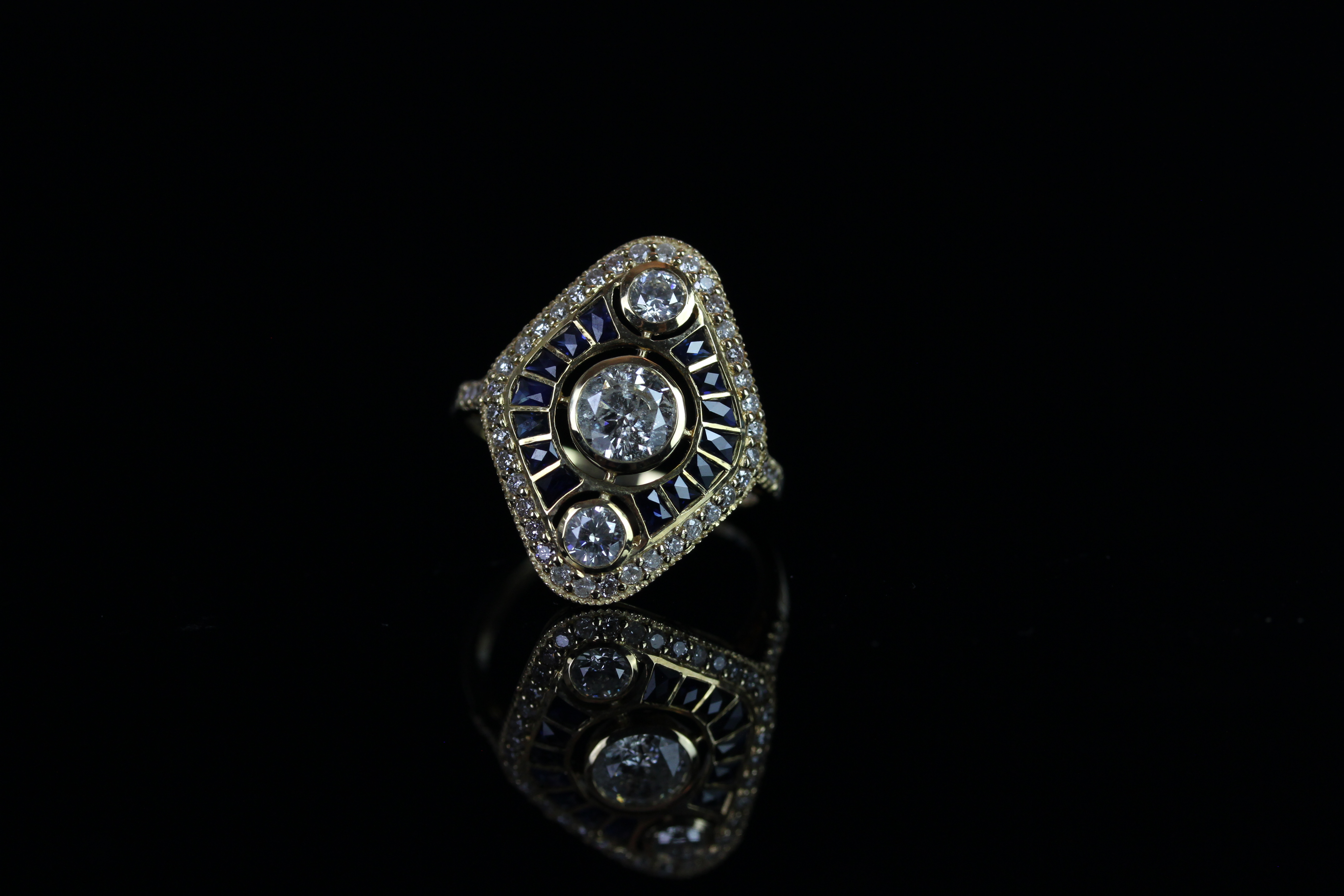 14ct Yellow Gold Diamond and Sapphire art deco style ring featuring centre, round brilliant cut