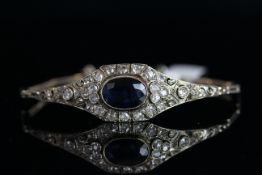 18CT SAPPHIRE AND DIAMOND VINTAGE BRACELET,centre stone estimated as 12x8.1mm, diamond total