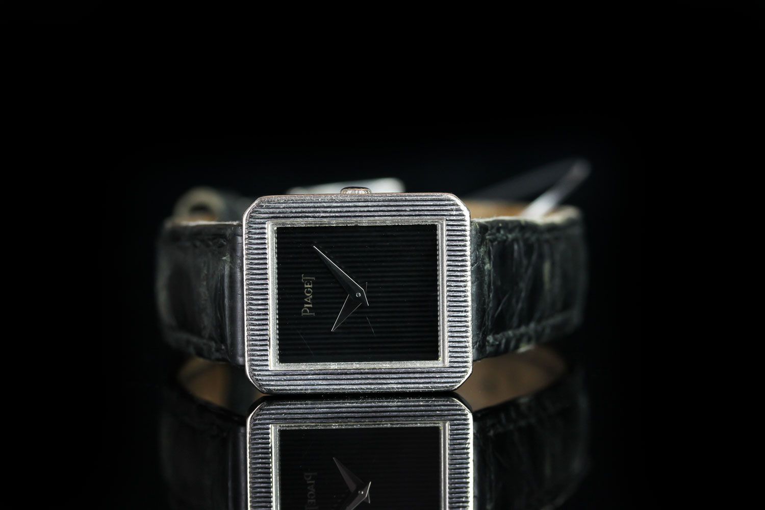 LADIES 18K WHITE GOLD VINTAGE PIAGET 8354 CIRCA 1999, oblong, black dial with silver sword hands,