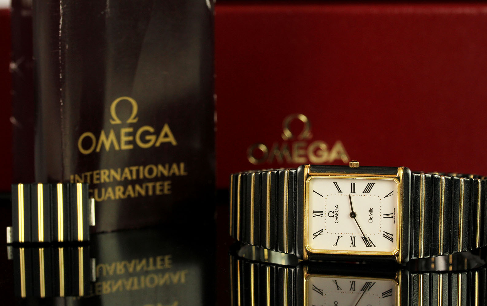 MID SIZE OMEGA DE VILLE WRISTWATCH W/ BOX & GUARENTEE, rectangular white dial with black roman