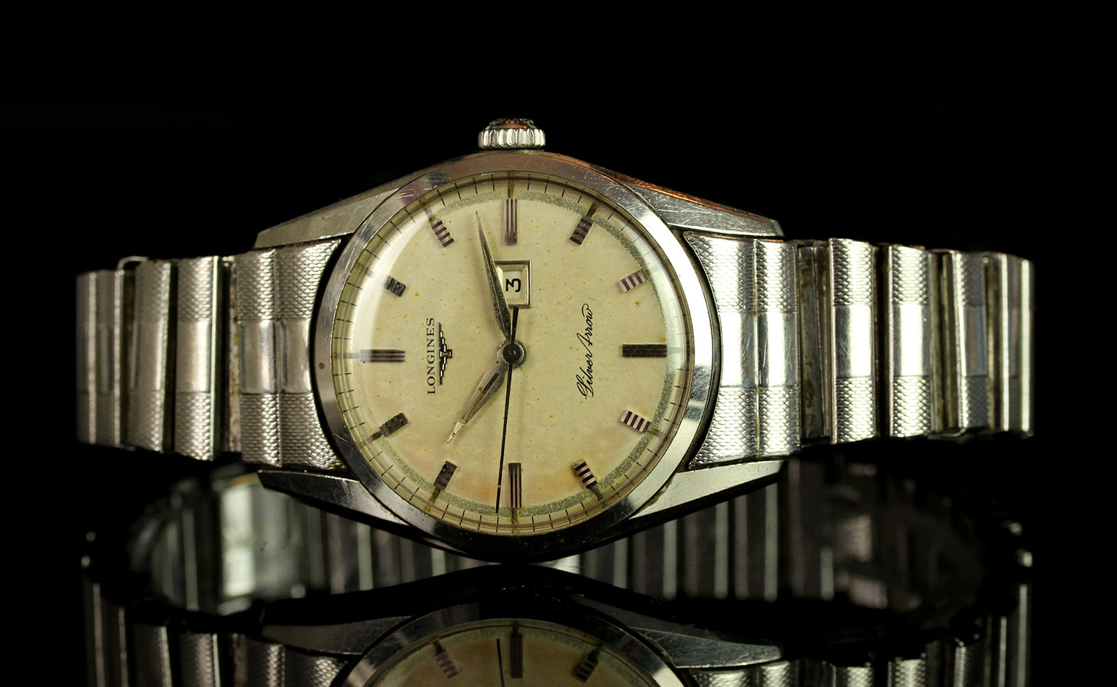 GENTLEMENS LONGINES SILVER ARROW WRISTWATCH, circular silver dial with hour markers, date at 3 0'