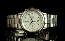 GENTLEMANS SEIKO 7T32 ALARM CHRONOGRAPH, round, silver dial with illuminated hands, silver baton