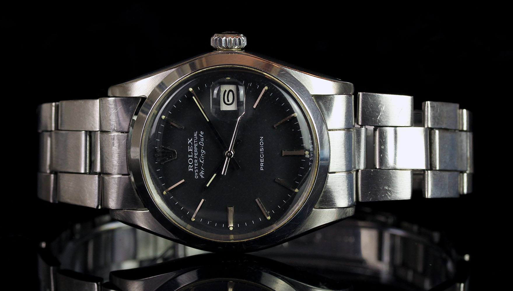 GENTLEMANS ROLEX AIRKING,MODEL 5700,CIRCA 1972,SN 332...,round, black dial with silver hands, silver