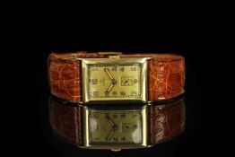 GENTLEMENS OMEGA OVERSIZE GOLD WRISTWATCH, rectangular gold dial with arabic numerals and subsidiary