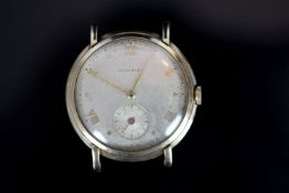 GENTLEMENS LONGINES OVERSIZE 9CT GOLD WRISTWATCH CIRCA 1950, circular patina silver dial with gilt