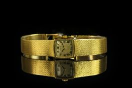 LADIES CARTIER 18CT GOLD WRISTWATCH, square aged dial with black roman numerals and hands, 17mm 18ct