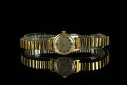 LADIES 9CT VINTAGE OMEGA, round, silver dial with black hands, black arabic markers,18mm gold