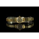 LADIES 9CT VINTAGE OMEGA, round, silver dial with black hands, black arabic markers,18mm gold