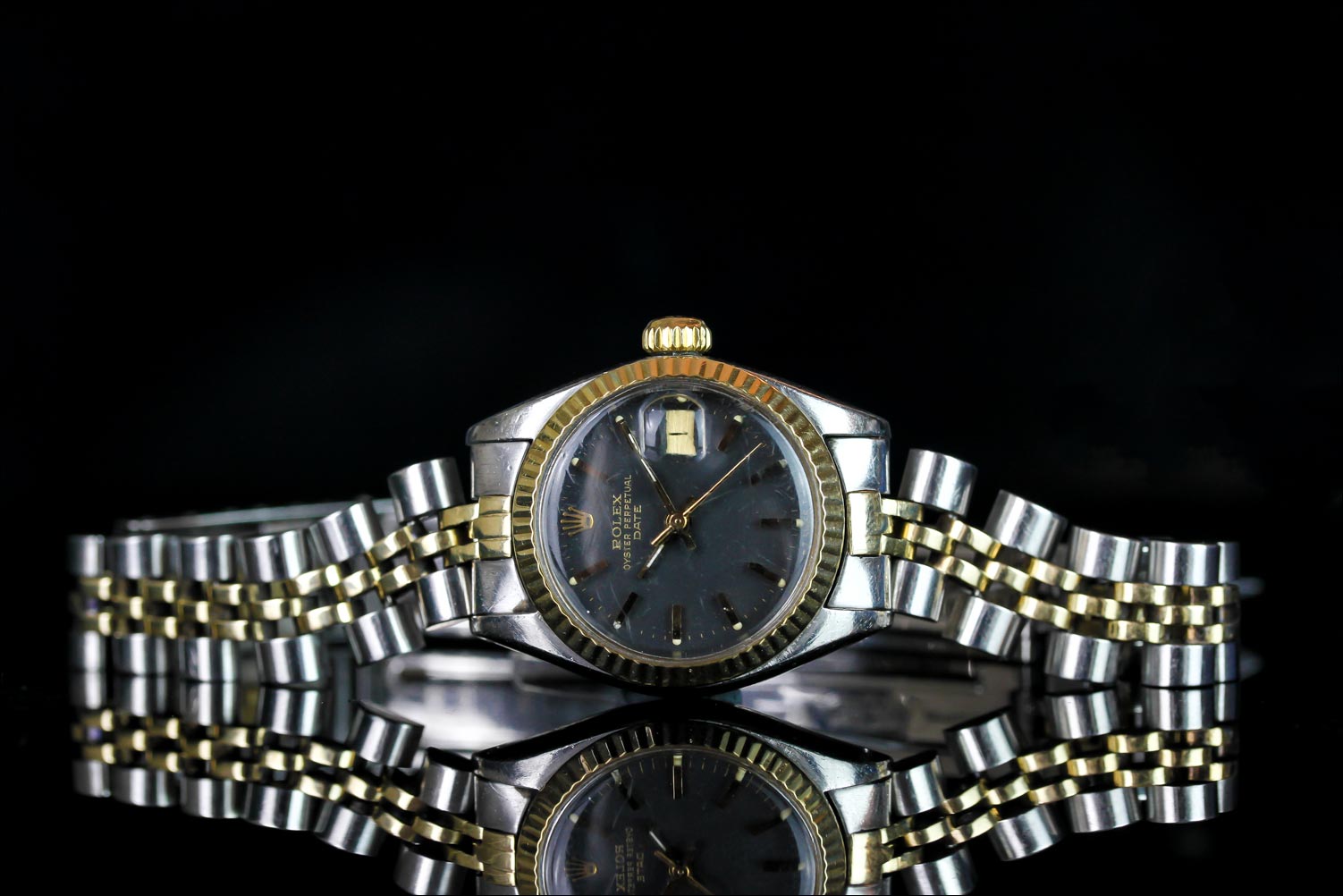 LADIES TWO TONE ROLEX DATEJUST,round,black dial with gold hand, gold markers, date aperture at 3 o