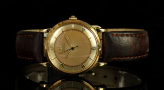 GENTLEMANS 18K OMEGA , round, two tone gold dial, gold arabic and baton markers, 32mm gold case,