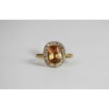 Imperial Topaz & Diamond ring, set with 1 oval cut imperial topaz approximately 2.05ct, surrounded