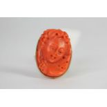 Coral cameo ring, carved coral cameo 22.5x16.5mm, mounted in 18ct, circa early 20th century